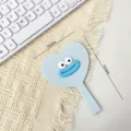 Blue heart-shaped makeup mirror with cute cartoon face and handle for daily student use. - Blue