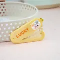 Peigne pliant portable jaune avec jolie décoration de poupée de dessin animé et chaîne. - Peigne de coiffage pour chaton