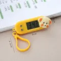 Mini portable electronic clock with cute puppy design, perfect for students and study. - Yellow