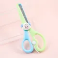Kids safety scissors with cute cartoon animal design, blue and green handles, ideal for craft. - Puppy
