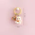 Süßer Cartoon-Katzen-Schlüsselanhänger mit Mondglocke, modischer Taschenanhänger DIY - (Beige - Kätzchen) Schlüsselanhänger-Ring