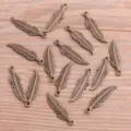 Antique bronze feather metal charms pendants for DIY jewelry making bracelets necklaces crafts - Antique Bronze