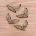 Colgantes de metal con forma de cola de sirena de bronce para joyeria DIY, estilo vintage. - Falda sirena / 18x27mm / Bronce Antiguo