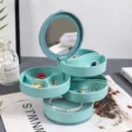 Boîte à Bijoux Rotative Organisateur de Boucles d'Oreilles Bleu avec Miroir - Bleu