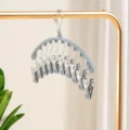 Grey multi-clip sock drying rack with coated clips, ideal for laundry and underwear organization. - Quiet Grey