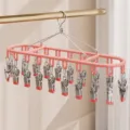 Pink stainless steel 18-clip drying rack for socks underwear laundry organization - 18 Clips / Pink