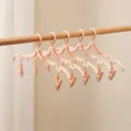Draagbare opvouwbare reiskledinghangers in roze, set van 5 met 10 clips voor reizen en hotels. - Met clip / 5 Stuks/Pak / Roze