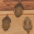 Vintage bronze hollow oval bezel pendant tray for DIY time gem jewelry making supplies. - Antique Bronze