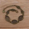 Bracelet DIY en bronze brut avec plateaux ovales et amulettes main de hamsa pour création de bijoux. - Style 2 (Main de Hamsa) / 13x18mm / Bronze Antique