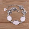 Base de bracelet vierge en alliage argent antique avec plateaux ovales 13x18mm - Style 7 (Fleur Ajourée) / 13x18mm / Argent Antique