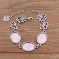 DIY Alliage Vide Cadre Bracelet Base 13x18mm Ovale Plateau Floral Breloque Bijoux Fabrication - Style 8 (Lotus) / 13x18mm / Argent Antique