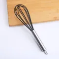 Frusta da cucina in silicone nero con manico in acciaio inox per cottura dolci - Frusta / Nero