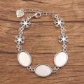 Silberfarbenes DIY Bettelarmband Basis mit Schneeflocken Anhängern und ovalen Fassungen. - 13x18mm Ovaler Boden / Antiksilber
