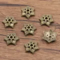 Antique bronze alloy flower bead caps, stylish spacer charms for DIY jewelry making. - Hexagonal Hollow Style (1035) / 1 Piece/Pack (4x13mm) / Antique Bronze