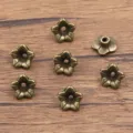 Antique bronze flower bead caps, DIY alloy spacer beads for bracelet and necklace making. - Five-Petal Flower Style(3299) / 4*9mm / Antique Bronze