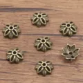 Antique bronze alloy flower bead caps and spacer charms for DIY jewelry making bracelets necklaces - Hollow Flower Style(3501) / 4*10mm / Antique Bronze