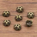 Antique bronze alloy flower bead caps, hollow spacers for DIY handmade bracelets and necklaces. - 4334 Style (4334) / 4x9mm / Antique Bronze