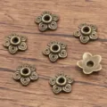 Antique bronze flower metal spacer beads for DIY jewelry making, bracelets and necklaces. - 5223 Style (5223) / 1 Piece (3x9mm) / Antique Bronze
