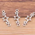 Pendentifs connecteurs en métal évidé en forme d'étoile argentée pour bijoux DIY bracelet collier. - Connecteur Étoile Creuse (No. 39) / 9x25mm / Argent antique
