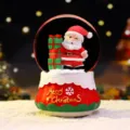 Christmas snow globe featuring Santa Claus with gifts, glowing light and festive holiday decor. - 8510 Holding Gift Box / Medium 80# LED Light+Music