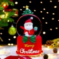 Weihnachten Weihnachtsmann Schneekugel beleuchtet Tischdekoration festliches Geschenk - 2062 Sitzende Mütze Rot / Groß 100 Schnee+Licht+Musik