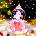 Pink Christmas snow globe music box with Santa Claus, perfect bedroom desktop decor. - 2061W Standing Hat (Pink) / Medium 80# LED Light + Snowfall