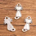 Pendentifs chat en alliage breloques pour la fabrication de bijoux DIY accessoires collier bracelet. - Style Chat (#9) / 12x22mm