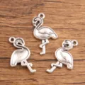 Pendatifs gracieaux en alliage de flamants roses pour fabrication de bijoux faits à la main. - Style Flamant Rose (27) / 16x28mm / Argent antique