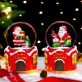 Christmas snow globe with glowing Santa Claus figurine and red house base for desktop decor. - 2044 Holding Wreath / Medium 80# LED Light+Music