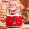 Bola de nieve navideña luminosa con papá Noel y muñeco de nieve, decoración festiva. - Estilo Papá Noel y Muñeco de Nieve con Saco (389) / Grande 100 Nieve+Luz+Música