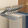 Grey multi-layer pants hanger, space-saving S-shaped closet organizer for trousers. - Kids Reverse Style / Quiet Grey