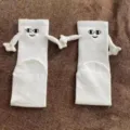 Cute magnetic holding hands white couple socks with lovely doll embroidered faces. - One Size / Smile Embroidery (Magnetic) / White