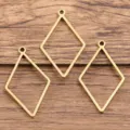 Montures pendentifs géométriques en acier inoxydable doré pour la création de bijoux. - Motif diamant / Grand 16x28mm (1 Pièce) / Or