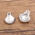 Edelstahl Muschel Anhänger Variante, ideal für DIY Schmuckherstellung und Meeresaccessoires. - Muschelanhänger (949) / 1 Stück (9*10mm) / Stahlfarben