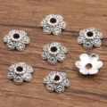 Antiek zilveren bloem kralenkapjes voor DIY sieraden maken, legering afstandshouder armband. - Zesbladige Bloem Holle Stijl (1659) / 3*10mm / Antiek Zilver