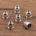 Zilveren legering bel kraal caps afstandhouders voor DIY armbanden kettingen sieraden. - Klokvormige 3D Kraalkap (2903) / 1 Stuk (10x11mm) / Antiek Zilver