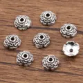 Antiek zilveren bloem kralenkapjes legering holle afstandshouders voor DIY armband ketting sieraden. - Meerlaagse Holle Kraalkap (4017) / 3x7mm / Antiek Zilver