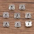 Antiek zilveren bloem tussenkralen, holle DIY legering bedels voor armbanden en kettingen. - Prachtige Holle Kraalkap (4033) / 2x7mm / Antiek Zilver