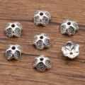Antiek zilveren bloem kralenkapjes legering DIY armband ketting afstandshouder accessoires - Holle Kraalkap (4334) / 4*9mm / Antiek Zilver