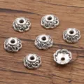 Antiek zilveren legering bloem kraalkapjes afstandshouder voor DIY sieraden maken. - Holle Kraalkap (4883) / 3*9mm / Antiek Zilver