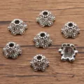Antiek zilveren bloem kralenkapjes voor DIY sieraden maken en armband metaal afstandhouders. - Reliëfkorrel Holle Stijl (5217) / 1 Stuk/Verpakking (7x12mm) / Antiek Zilver
