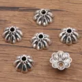 Antiek zilverkleurige legering bloemvormige kraalkapjes voor DIY sieraden ketting armband - Holle Kraalkap (5225) / 1 Stuk/Verpakking (8*17mm) / Antiek Zilver