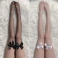 Vrouwen visnet kousen met strik over de knie dij hoge sokken zwart wit variant - Eén maat / Zwart + Wit