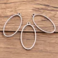 Pendentifs lunettes ovales en acier inoxydable pour bijoux DIY, cadres robustes. - Ovale / Grand 14x28mm (1 Pièce) / Acier