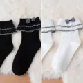 Cute ruffled mid-calf socks with plaid bow, sweet Lolita style variant in black and white. - One Size / 2 Pairs/Pack / Black + White