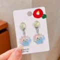 Cute cartoon shell clip-on earrings for kids, sweet ocean style jewelry detail view. - Gradient Shell Pair (Cardboard Packaging)