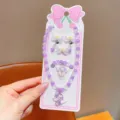 Close-up of children purple pearl necklace bracelet and earrings cute unicorn jewelry set. - Unicorn Set / Cardboard Included / Light Purple