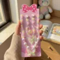 Close-up of children pearl jewelry set featuring cute butterfly motifs and colorful beads. - Butterfly 5-Piece Set / Backing Card Included / Light Green