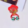 Close-up of cute Christmas tree hair tie with green resin charms on a red elastic band. - 2# Christmas Tree Hair Tie Pair