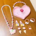 Cute kids unicorn jewelry set detail, pink heart storage box, necklace, hair clips, and rings. - #5 Sleeping Unicorn 8-Piece Set